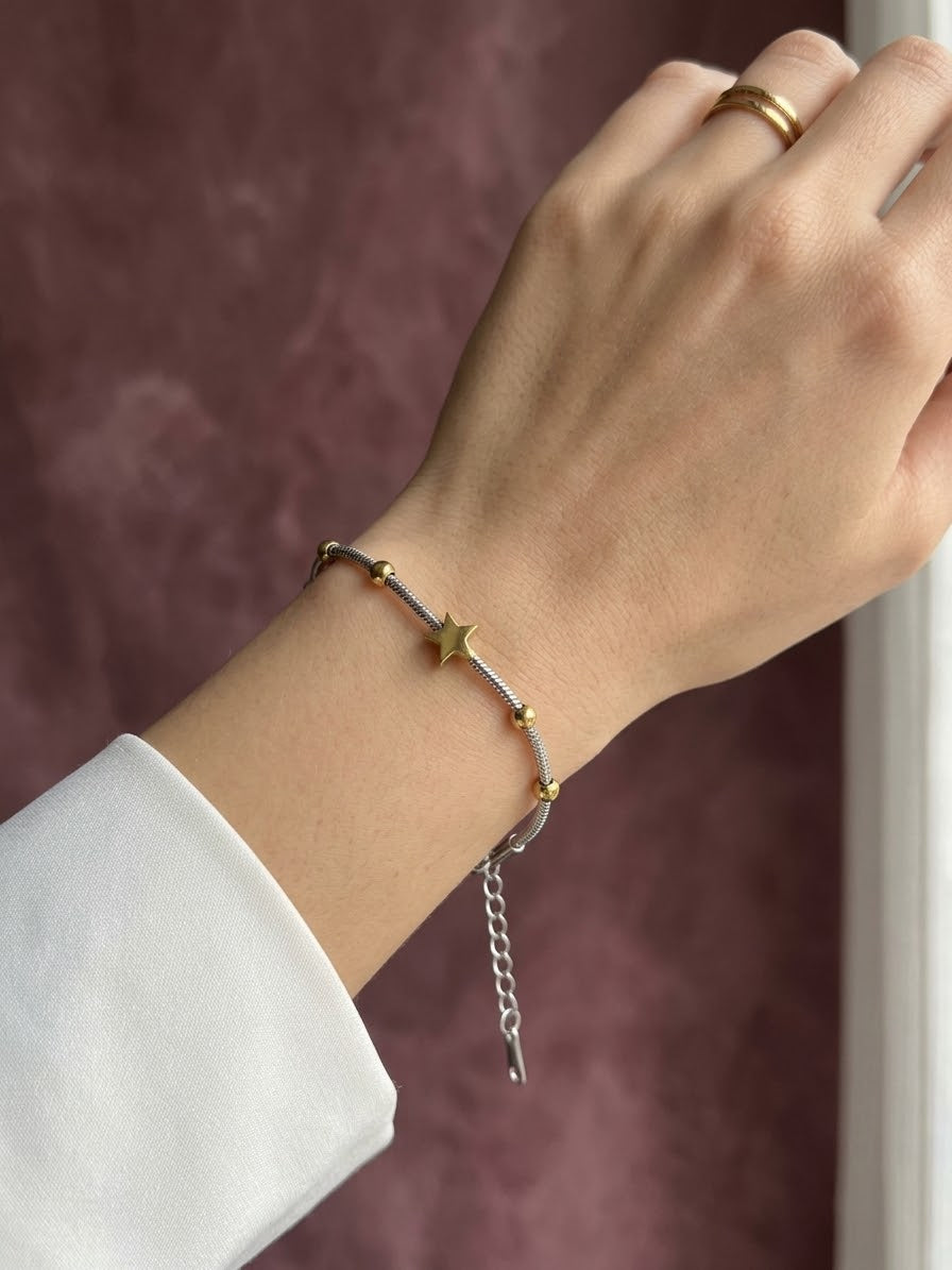 Pulsera estrella doble tono